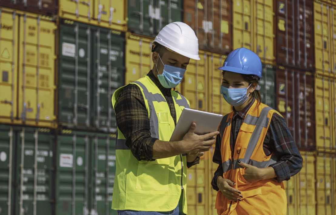 Two federal workers discussing in shipyard at Cherry Hill, NJ