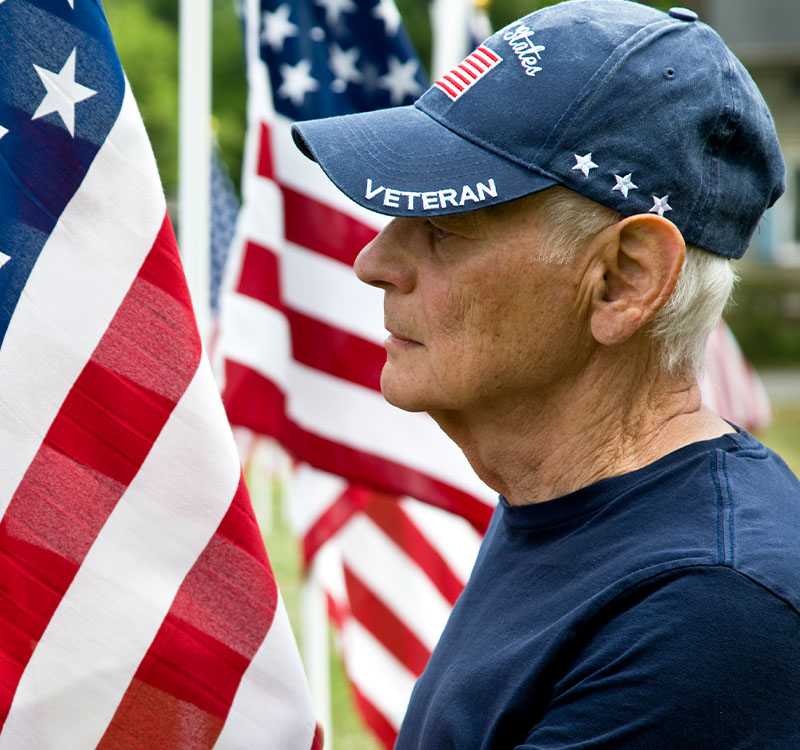 United States Veteran among American Flags