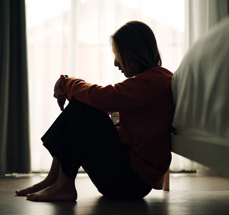 Woman depression in bedroom