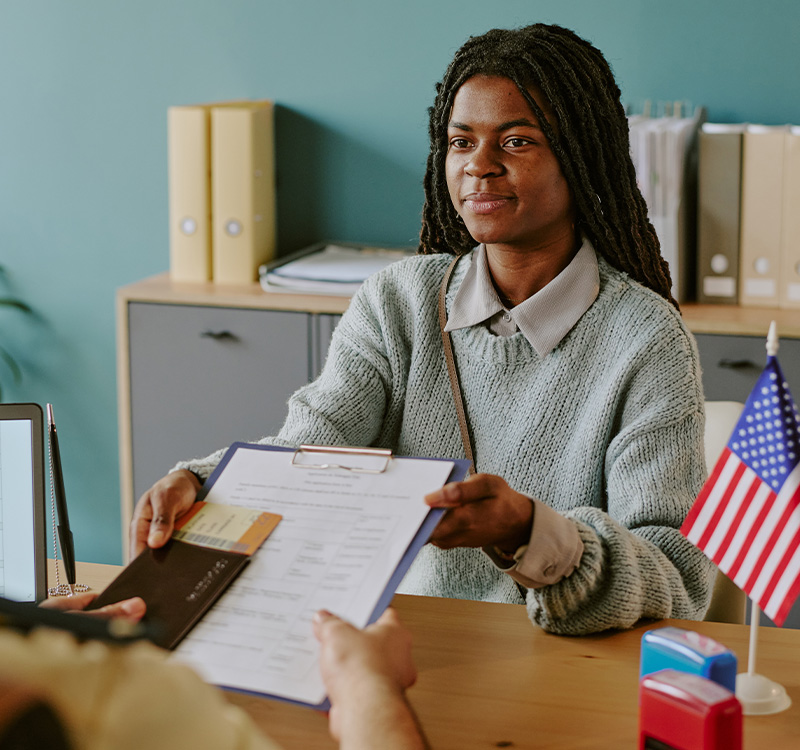 African American Woman Having Visa Interview