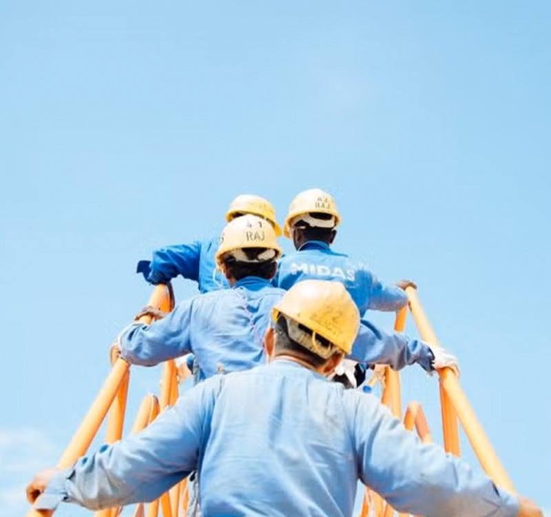 Workers going up the ladder