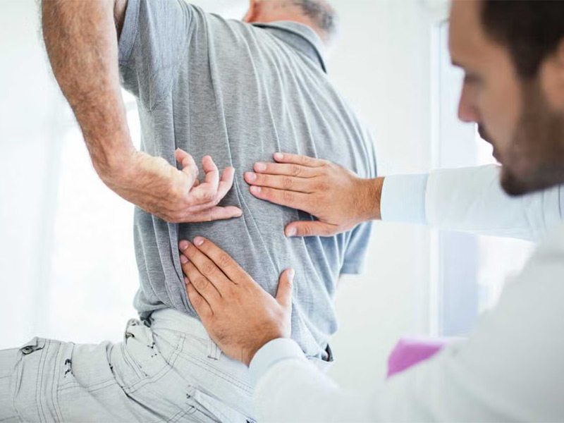 Patient receiving treatment for back injury